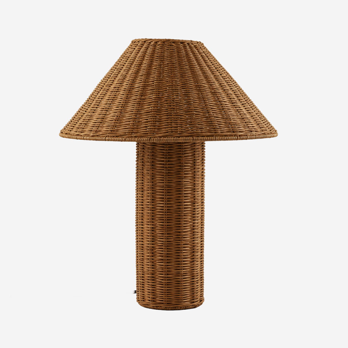 A rustic brown woven rattan table lamp with a tapered conical shade and a matching cylindrical base, shown against a plain light gray background.
