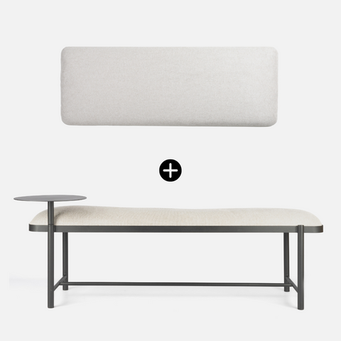 Modern bench with a white cushion and metal frame on a white background with headboard